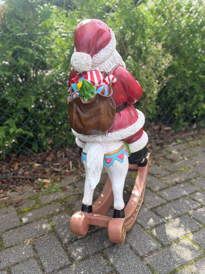 Kerstman - Kerstman op schommelpaard - 85 cm hoog
